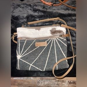 Cross body purse. Designs with cow print